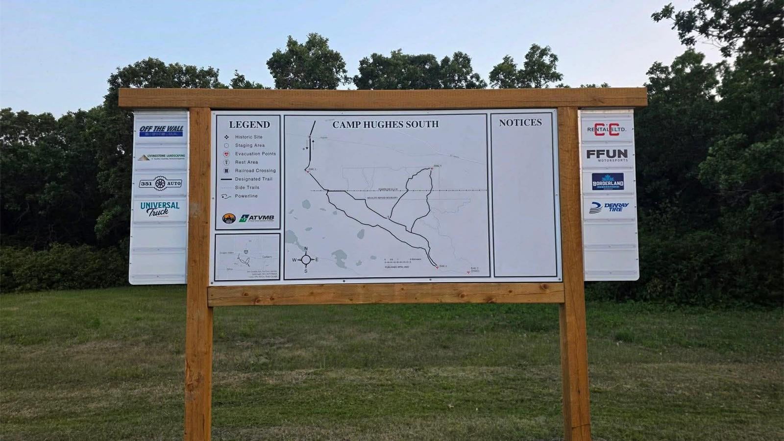 Sponsor logos on the Camp Hughes South trailhead kiosk